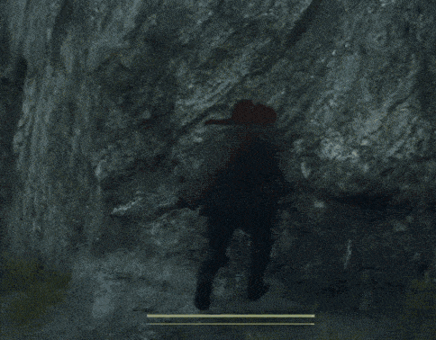 a person in a video game is climbing a rocky cliff
