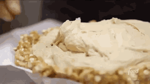 a close up of a piece of cake with frosting on it