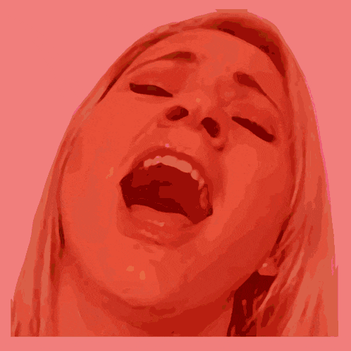 a woman with her mouth open and her eyes closed