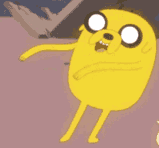 a cartoon character named jake from adventure time is dancing