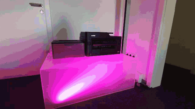a brother printer sits on top of a table
