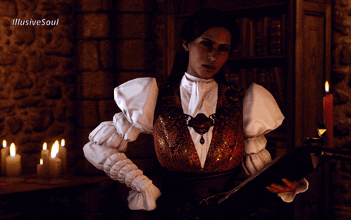 a woman is holding a book in front of candles and a sign that says illusivesoul