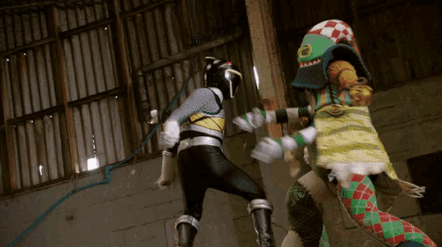 two cartoon characters are fighting in a warehouse