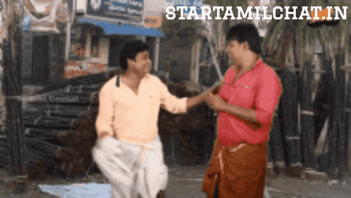 two men are standing next to each other in front of a sign that says startamlchat.in