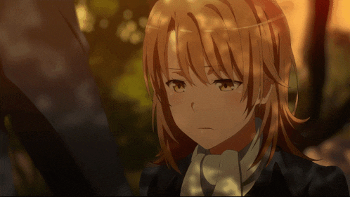 a close up of a girl with brown hair