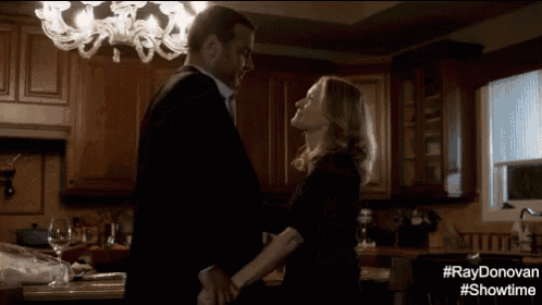 a man and a woman are dancing in a kitchen with #raydonovan showtime written on the bottom