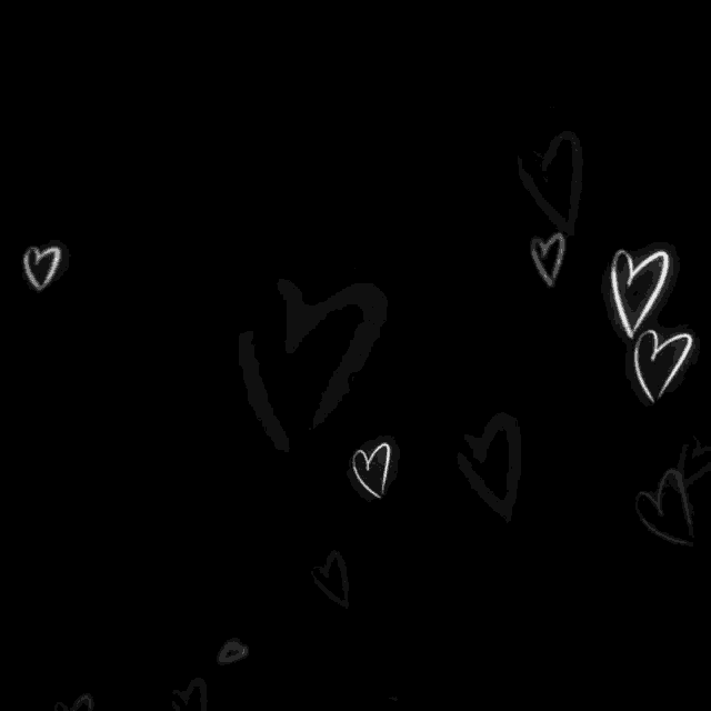 a bunch of white hearts on a black background