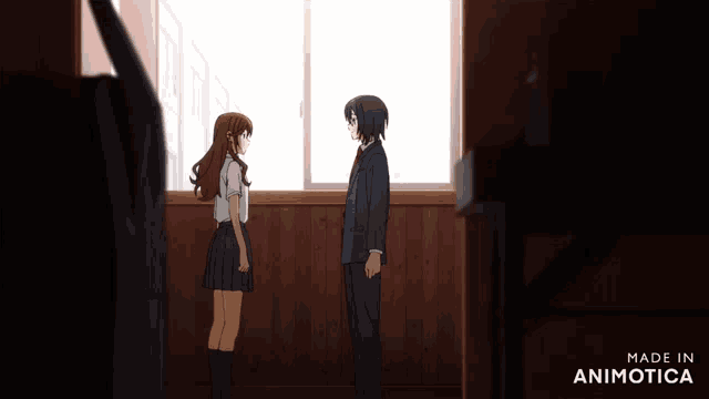 a boy and a girl are standing in front of a window and the words made in animotica are below them