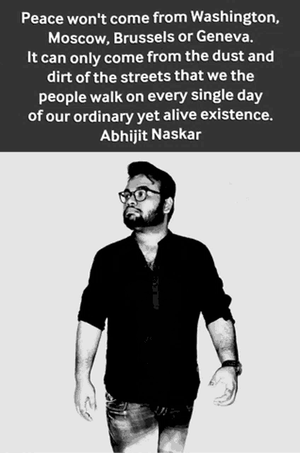 a black and white photo of a man with a quote on the bottom
