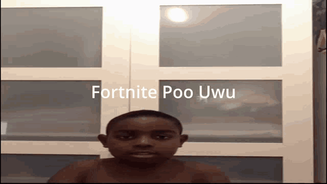 a shirtless child is standing in front of a wall with the words fortnite poo uwu written on it