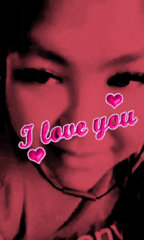 a close up of a woman 's face with the words " i love you " written on it