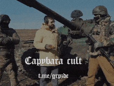 a group of soldiers are standing in front of a tank with the caption cappbara cult t.me/grp3de