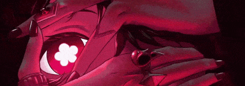 a close up of a person 's eyes with a flower in them