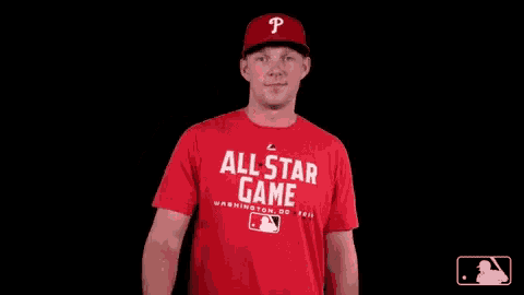 a man wearing an all star game washington dc shirt