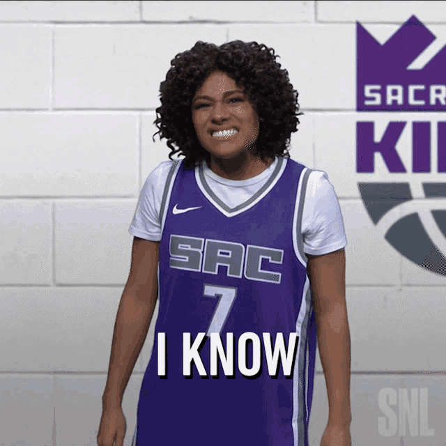 a person wearing a sacramento kings jersey with the number 7 on it