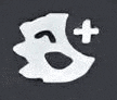 a white mask with red horns and a plus sign on it .