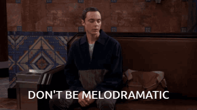 a man sitting on a couch with the words do n't be meloddramatic written on the bottom