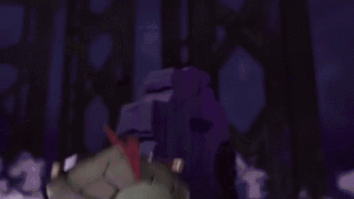 a teenage mutant ninja turtle is holding a rock in his hands in a cartoon scene .