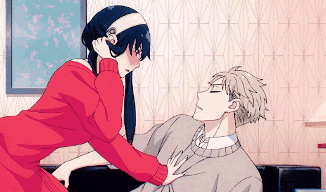 a man and a woman are sitting on a couch