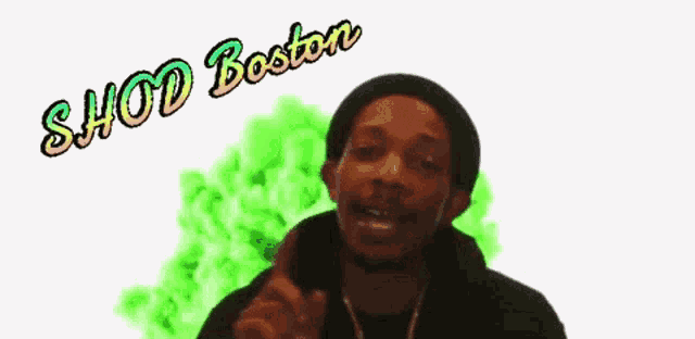 a man covering his mouth with his hand with the words shod boston behind him