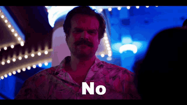 a man in a hawaiian shirt says no