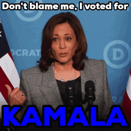 a picture of kamala speaking into a microphone