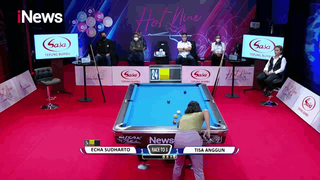 a pool table with a sign that says inews