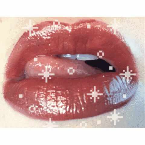 a close up of a woman 's lips with red lipstick and sparkles