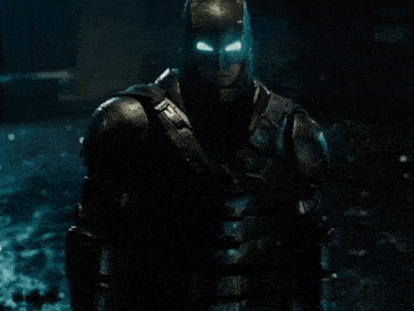 a close up of a person in a batman suit
