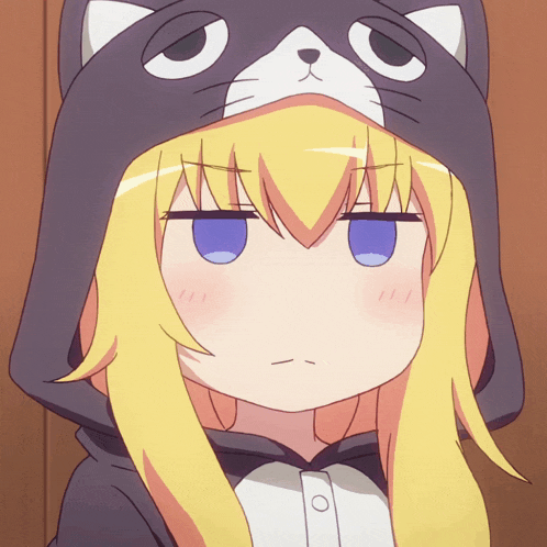 a girl with blonde hair and blue eyes wears a cat hood