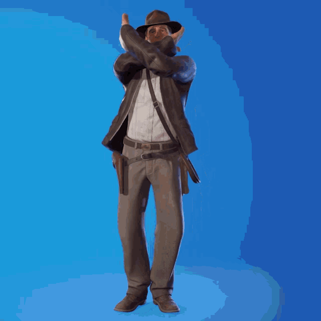 a man in a cowboy hat is standing with his arms in the air