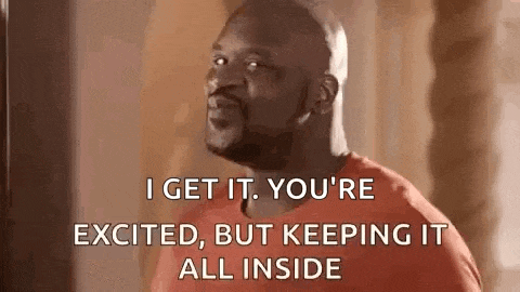 a man in a red shirt is saying `` i get it . you 're excited , but keeping it all inside ''