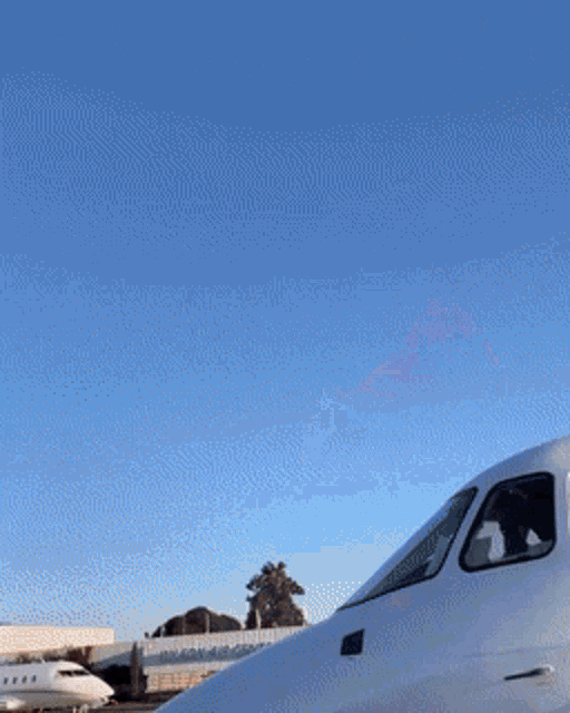 a white airplane with the number 500 on the front of it