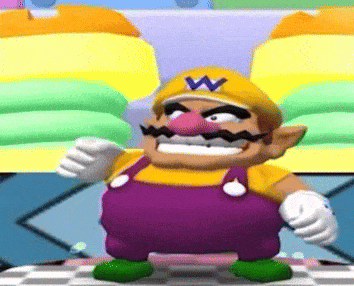 a cartoon character with a yellow hat and purple overalls is standing on a checkered table .