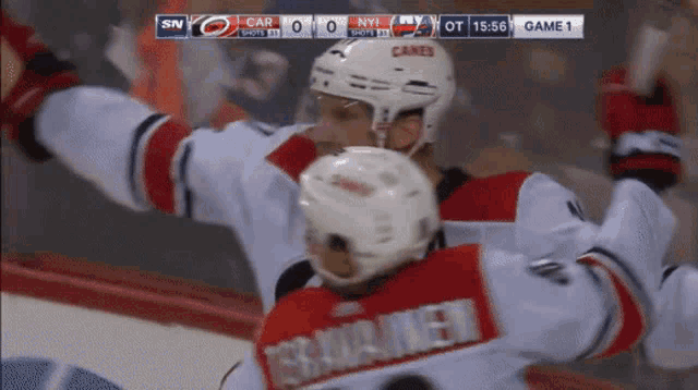 a hockey game is being played between the carolina panthers and new york islanders