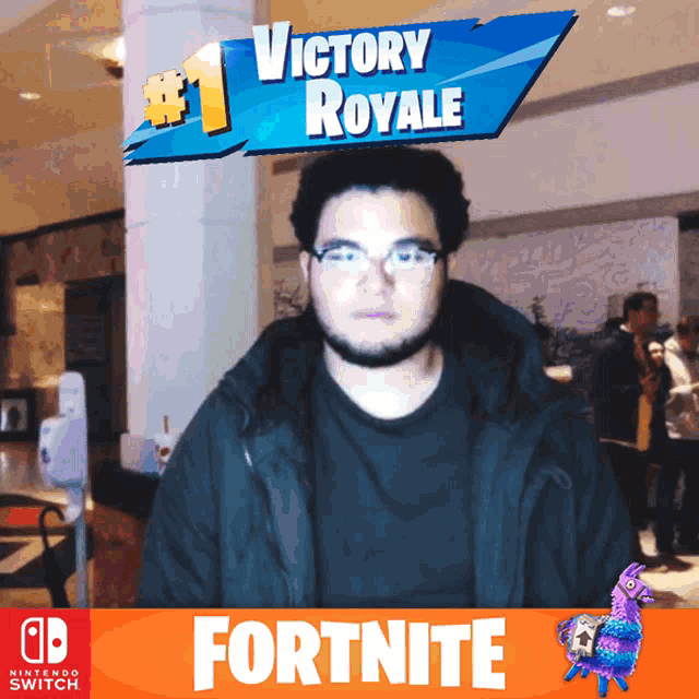 a man is standing in front of a sign that says victory royale on it