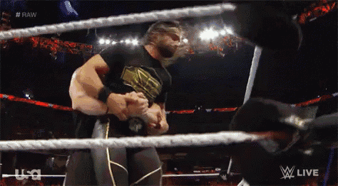 a man in a wrestling ring with the words raw on the bottom