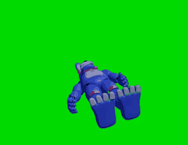 a blue toy bear is laying down on a green screen