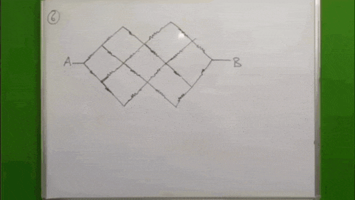 a man is drawing a diagram on a white board with the letter b on it