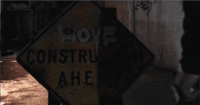 a construction ahead sign is on fire