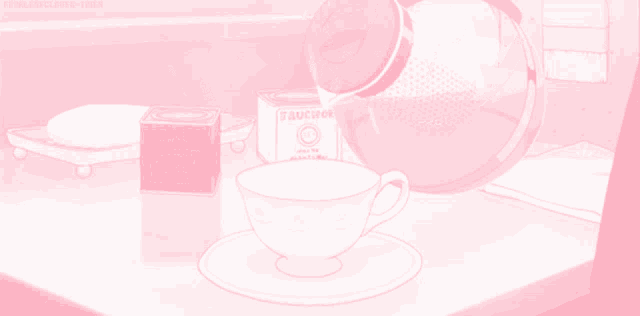a cup of tea is being poured into a saucer next to a box that says buckmore