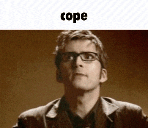 a man wearing glasses and a jacket is looking up at the word cope