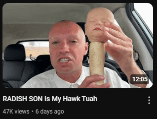 a man in a car holding a baby head that says radish son is my hawk tuah