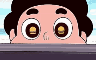 a cartoon character with a hamburger in his eyes is peeking over a table .