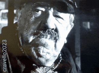 a black and white photo of a man with a mustache and the year 2023