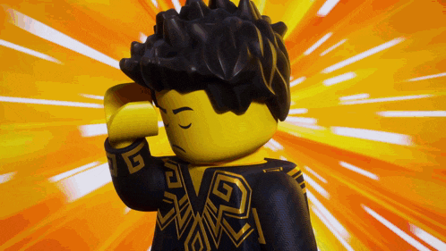 a lego figure is covering his face with his hand while standing in front of an orange background