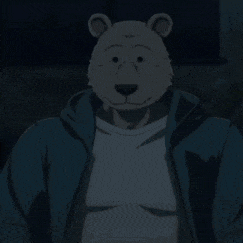 a man with a teddy bear 's head is wearing a blue jacket .