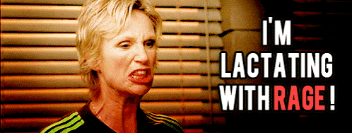 a woman says i 'm lactating with rage in front of a window