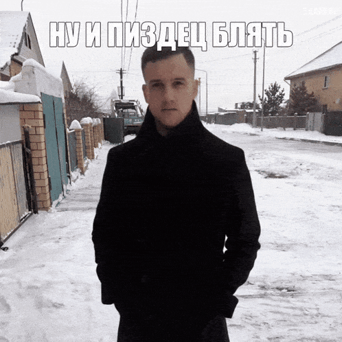 a man in a black coat stands in a snowy street with a luma logo above him