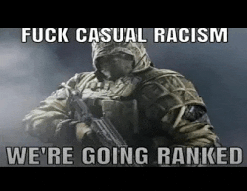 a soldier is holding a gun and says `` fuck casual racism we 're going ranked ''